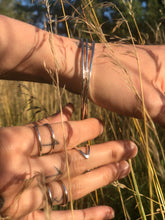 Load image into Gallery viewer, Sterling silver Bangle with sterling silver pebble charm